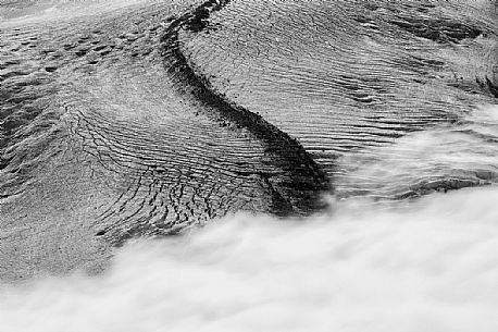 Detail of Gorner glacier in the fog from Gornergrat top, Monte Rosa or Breithorn mountain range, Zermatt, Valais, Switzerland, Europe
Detail of Gorner glacier in the fog from Gornergrat top, Monte Rosa or Breithorn mountain range, Zermatt, Valais, Switzerland, Europe