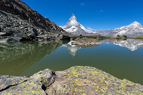 The Matterhorn or Cervino mount reflected in the Riffelsee Lake (Riffel lake), Gornergrat, Zermatt, Valais, Switzerland, Europe
The Matterhorn or Cervino mount reflected in the Riffelsee Lake (Riffel lake), Gornergrat, Zermatt, Valais, Switzerland, Europe