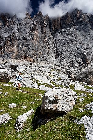 Hiker in the Marmolada mountain range, Ombretta valley, dolomites, Veneto, Italy, Europe Hiker in the Marmolada mountain range, Ombretta valley, dolomites, Veneto, Italy, Europe