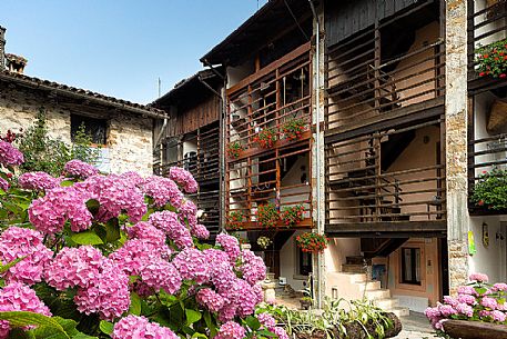 Traditional house with the dalz, the typical wooden balcony in the small village of Andreis, Friuli Venezia Giulia, dolomites, Italy, Europe