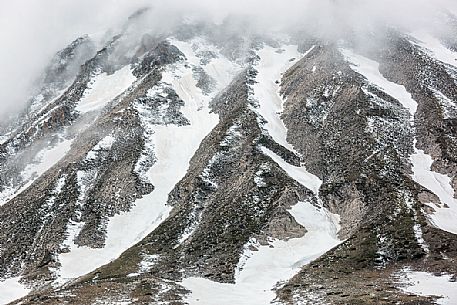 Thaw in the slope of Campo Imperatore, Gran Sasso and Monti della Laga national park, Abruzzo, Italy, Europe Thaw in the slope of Campo Imperatore, Gran Sasso and Monti della Laga national park, Abruzzo, Italy, Europe