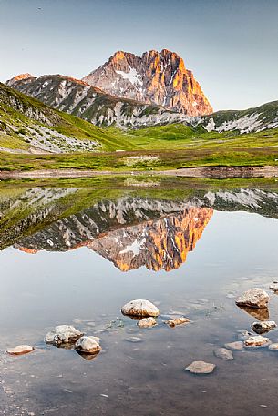 The Corno Grande peak reflected on Pietranzoni lake, Campo Imperatore, Gran Sasso and Monti della Laga national park, Abruzzo, Italy, Europe The Corno Grande peak reflected on Pietranzoni lake, Campo Imperatore, Gran Sasso and Monti della Laga national park, Abruzzo, Italy, Europe