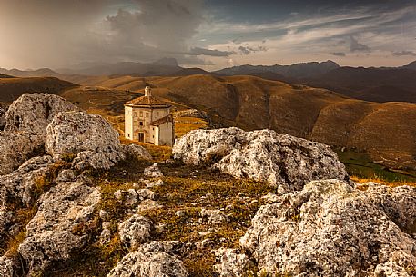 Madonna della Piet church near Rocca Calascio with Gran Sasso mountain range in the background, Gran Sasso national park, Abruzzo, Italy, Europe