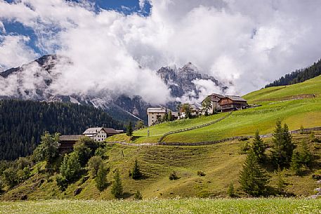Ladin Mountain Village of Misci in the valley of Mills against Puez group of mountains, Longiar, Badia valley, Trentino Alto Adige, Italy, Europe