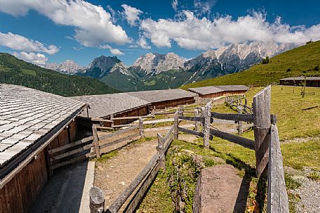 Ielma alm and in the background the Pesarine mountain range, Prato Carnico, Carnia, Friuli Venezia Giulia, dolomites, Italy, Europe