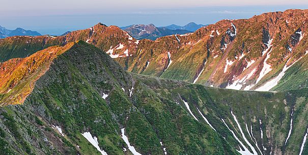 Crostis mount and in the background the Zoncolan peak, Carnic alps, Forni Avoltri, Friuli Venezia Giulia, Italy, Europe