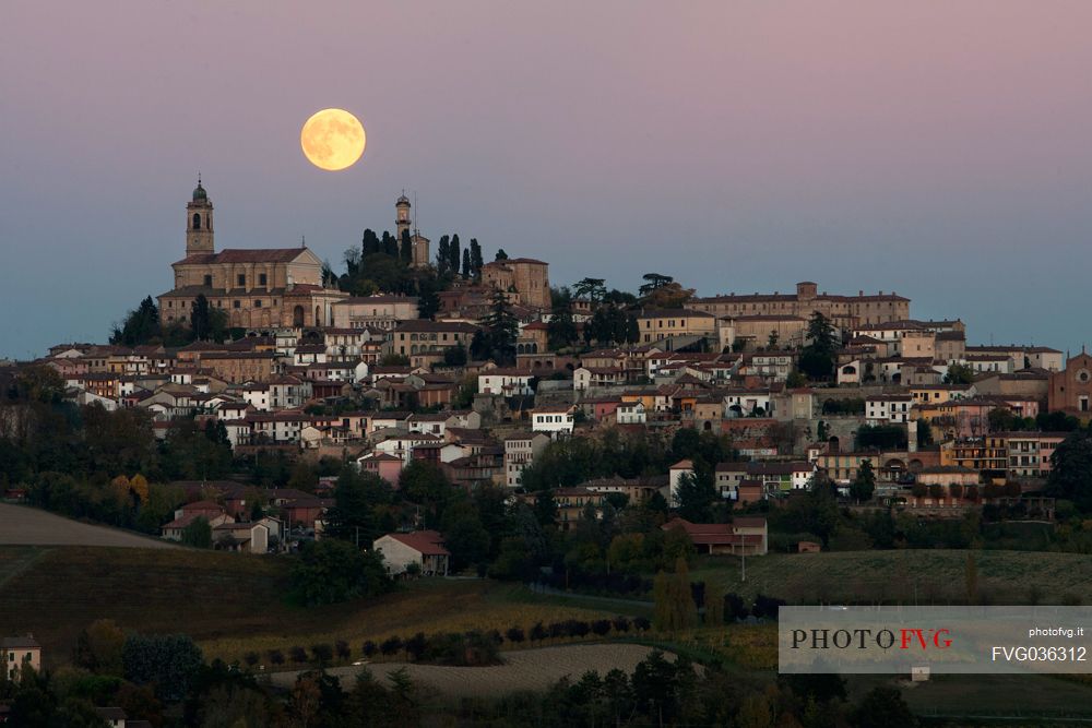 Full moon over Vignale Monferrato village, Monferrato, Piedmont, Italy, Europe