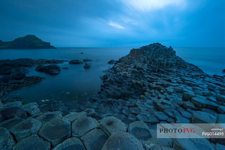 Magical atmosphere at the Giant's Causeway during the blue hour