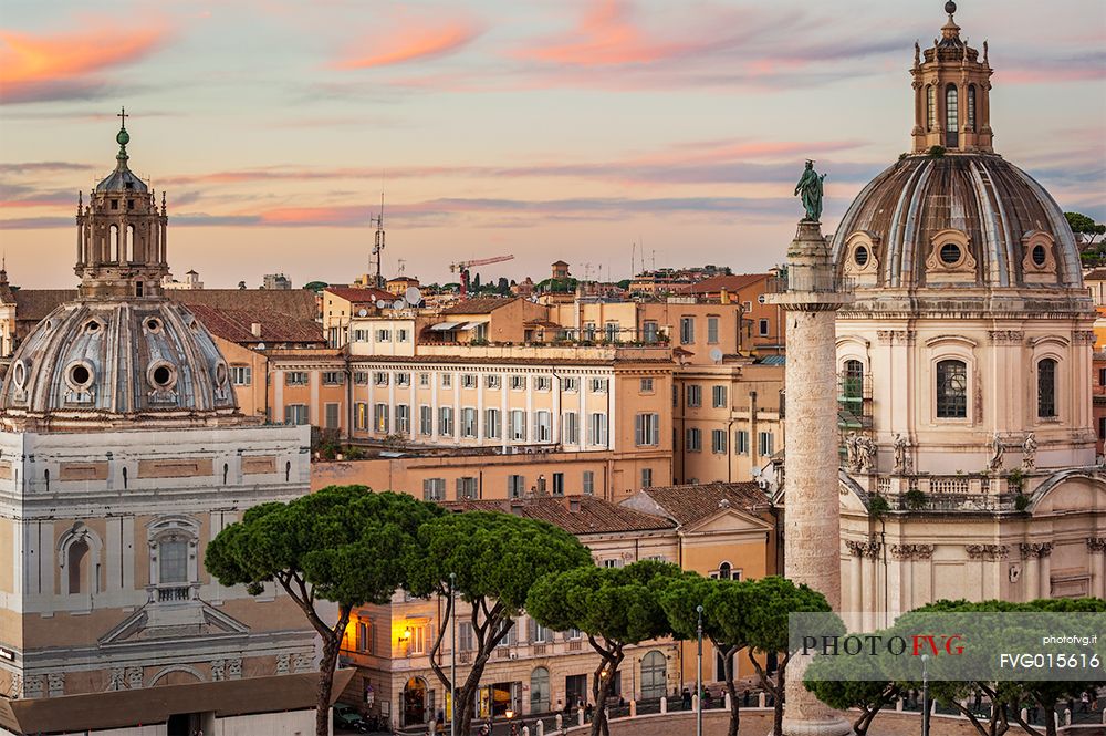 Beautiful point of view in Rome. You can see traian column on the right. In the foreground you can also see the maritime pines, which are typical of Rome's urban cityscape.