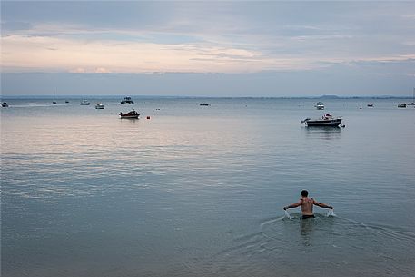 Cancale, in Brittany on the border with Normandy, is a small fishermen's village. It is not uncommon in the evening to see fishermen at the end of the day diving into the sea to relax.