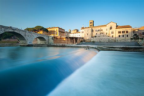 The Tiber Island is the only island in the Tiber river which runs through Rome and and has been connected with bridges to both sides of the river since antiquity The Tiber Island is the only island in the Tiber river which runs through Rome and and has been connected with bridges to both sides of the river since antiquity
