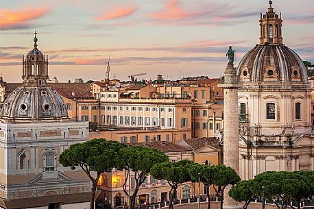 Beautiful point of view in Rome. You can see traian column on the right. In the foreground you can also see the maritime pines, which are typical of Rome's urban cityscape.