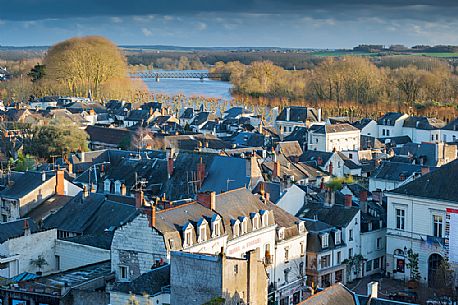 Chinon is maybe the most romantic and picturesque village of the Loire Valley, thanks to its ancient medieval streets and to its castle which dominates the river from above. Chinon is maybe the most romantic and picturesque village of the Loire Valley, thanks to its ancient medieval streets and to its castle which dominates the river from above.