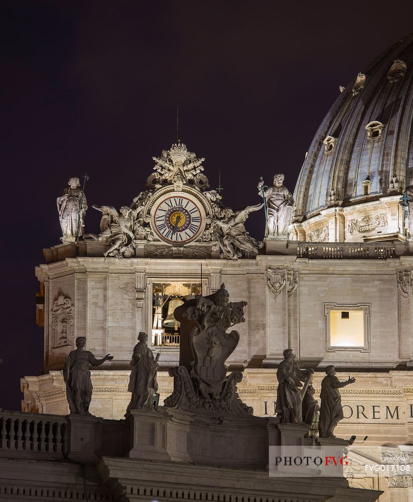 Rome: detail of the left part of the faade of St. Peter's Basilica with the clock