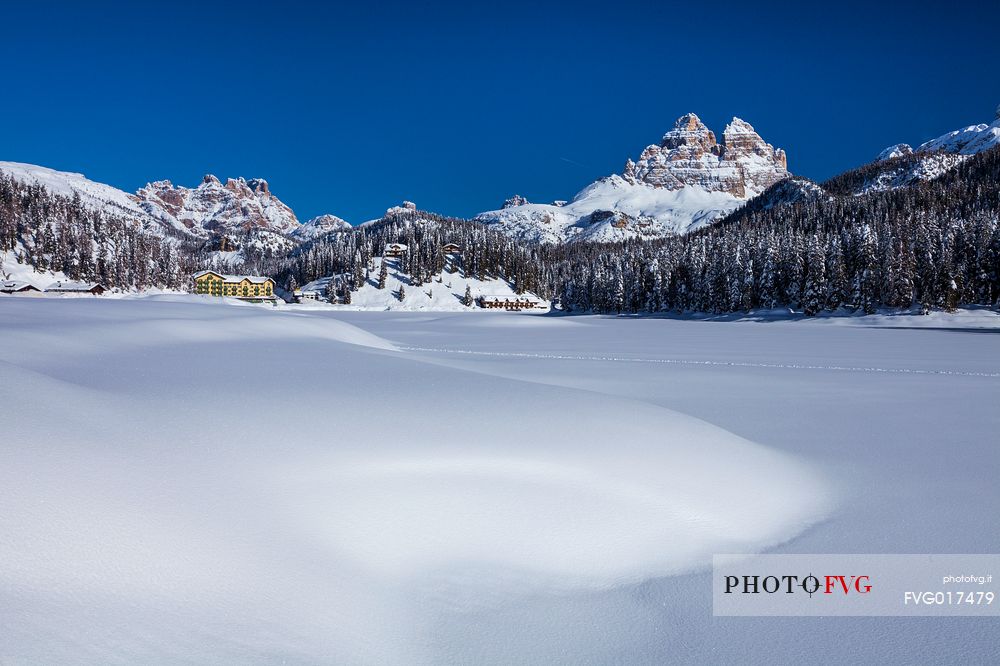 Misurina lake covered by snow with 