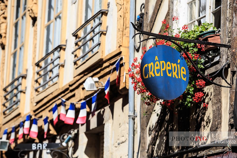 A Creperie's banner in a street of the center of the city of Rennes, Brittany, France