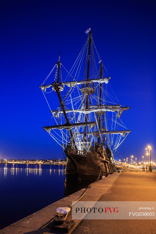 Night view ot the ancient sailing ship in the porto of Saint Malo town, Brittany, France, Europe