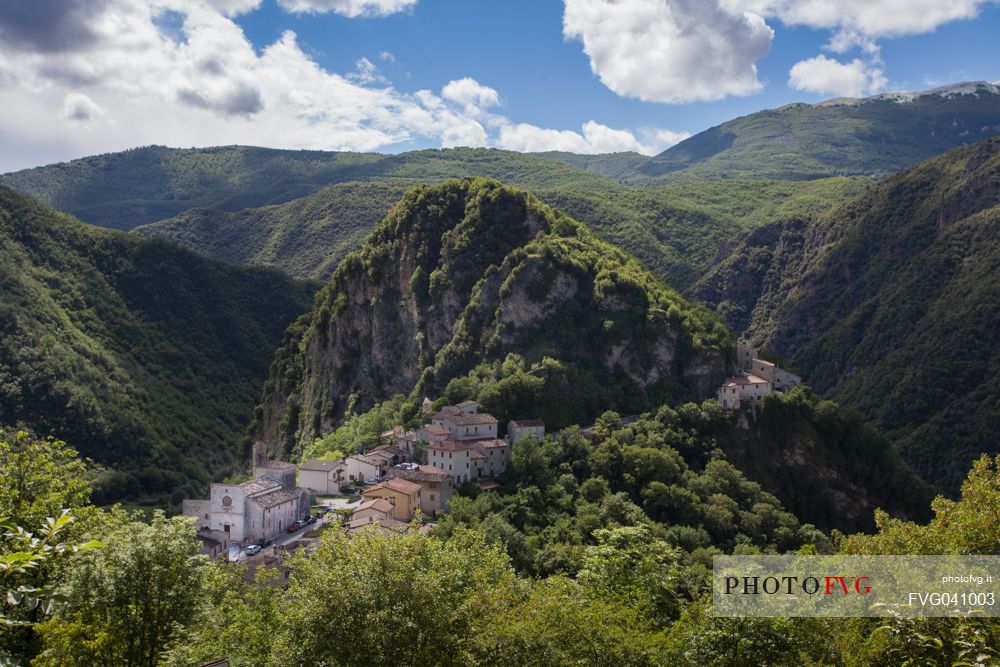 The ancient medieval village of Ponte in the middle of the mountains covered by dense and green woods, Valnerina, Umbria, Italy, Europe