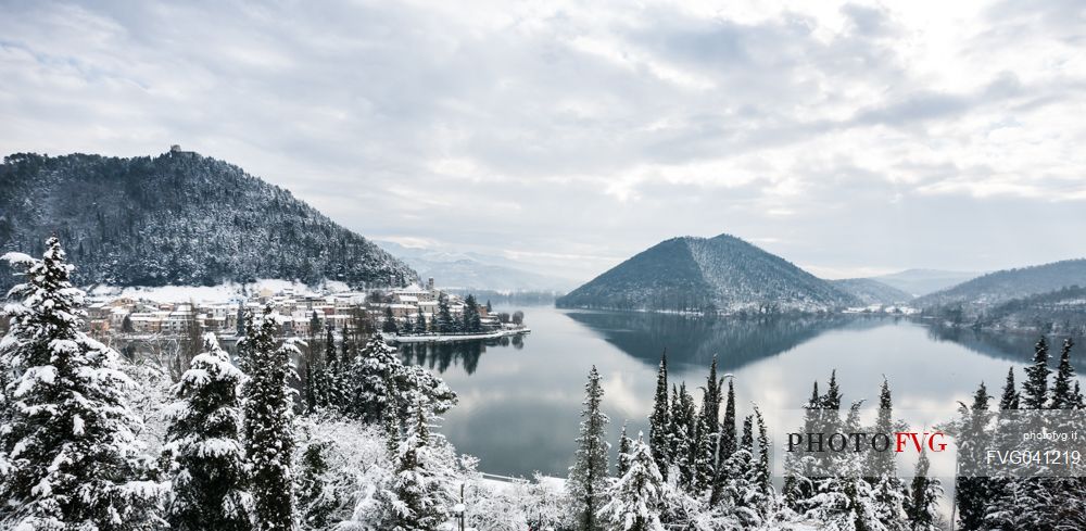 Overview of Piediluco lake and the village covered with snow on a winter day, Umbria, Italy, Europe