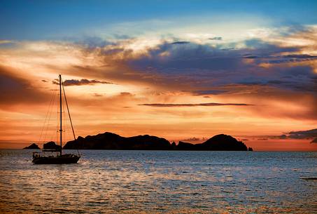 Wonderful sunset in Ponza with Palmarola island in background Wonderful sunset in Ponza with Palmarola island in background