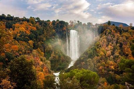 The Marmore waterfall surrounded by woods with autumn colors
The Marmore waterfall surrounded by woods with autumn colors