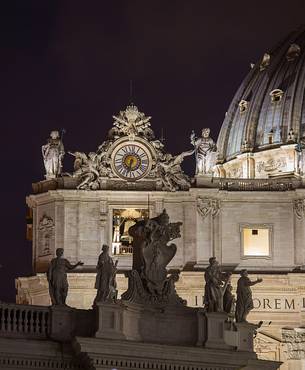 Rome: detail of the left part of the faade of St. Peter's Basilica with the clock