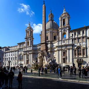 Rome. The fountain of the four Rivers (of the Bernini) in plaza Navona with the church of S. Agnese (of the Borromini) on the background.