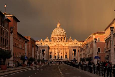 Rome: Street of the Conciliation with St. Peter's Basilica illuminated by the first light of the dawn Rome: Street of the Conciliation with St. Peter's Basilica illuminated by the first light of the dawn