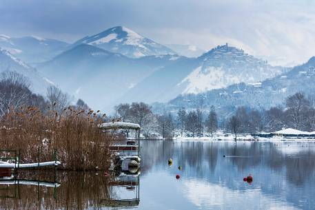 The ancient medieval village of Labro, in  Rieti's province, Lazio. On the background  mountains, covered by snow. Piediluco's lake waters in foreground.