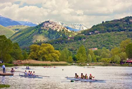 The ancient medieval village of Labro, in  Rieti's province, Lazio. On the background  mountains, covered by snow. Piediluco's lake waters in foreground.