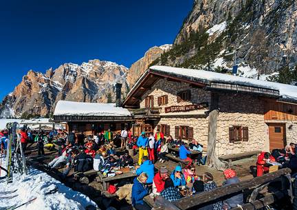 Along the ski slope Armentarola that from the Lagazuoi goes down in Badia valley it's pleasant to take a break to the restaurant of Scotoni alpine hut Along the ski slope Armentarola that from the Lagazuoi goes down in Badia valley it's pleasant to take a break to the restaurant of Scotoni alpine hut