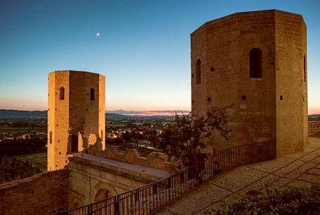 Properzio towers in Spello, Umbria, two dodecagonal towers that flank the door Porta Venere of Roman era. Properzio towers in Spello, Umbria, two dodecagonal towers that flank the door Porta Venere of Roman era.
