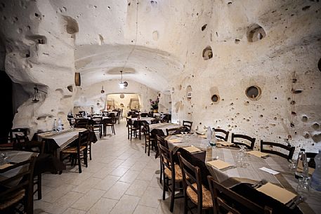 Interior of a typical restaurant in the cave, Sasso Caveso, Matera, Basilicata, Italy, Europe