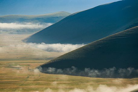 Pian Grande on Monti Sibillini national park, Castelluccio di Norcia, Umbria, Italy, Europe. Pian Grande on Monti Sibillini national park, Castelluccio di Norcia, Umbria, Italy, Europe.
