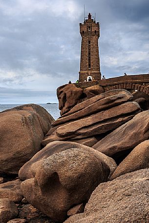 Pink Granite coast, pointe De Squewel, the Mean Ruz lighthouse built of granite from Ploumanac'h, Côtes-d'Armor province, Brittany, France, Europe Pink Granite coast, pointe De Squewel, the Mean Ruz lighthouse built of granite from Ploumanac'h, Côtes-d'Armor province, Brittany, France, Europe