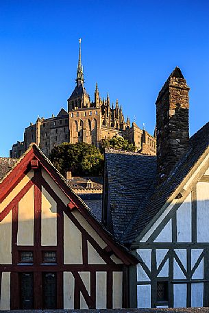 Houses in the old town and Benedictine abbey of Mont Saint-Michel, Normandy, France, Europe Houses in the old town and Benedictine abbey of Mont Saint-Michel, Normandy, France, Europe