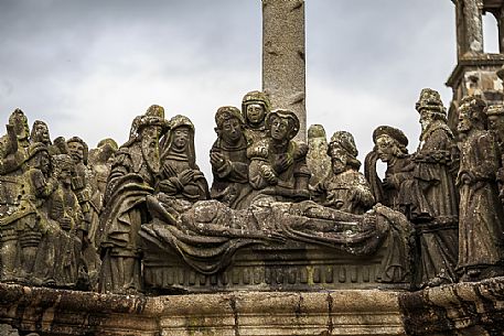 Detail of the Calvary located in the parish close, a peculiarity of the architecture and Christian art of Brittany, especially of the Finistère, Church of Saint Miliau, Guimiliau, France, Europe Detail of the Calvary located in the parish close, a peculiarity of the architecture and Christian art of Brittany, especially of the Finistère, Church of Saint Miliau, Guimiliau, France, Europe