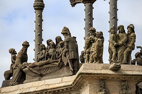 Detail of the Calvary located in the parish close, a peculiarity of the architecture and Christian art of Brittany, especially of the Finistère, Church of Saint Miliau, Guimiliau, France, Europe Detail of the Calvary located in the parish close, a peculiarity of the architecture and Christian art of Brittany, especially of the Finistère, Church of Saint Miliau, Guimiliau, France, Europe