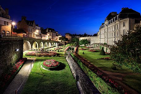 The famous gardens next to the medieval walls of the city of Vannes and in the background the Chateau de l'Hermine castle, Brittany, France, Europe The famous gardens next to the medieval walls of the city of Vannes and in the background the Chateau de l'Hermine castle, Brittany, France, Europe