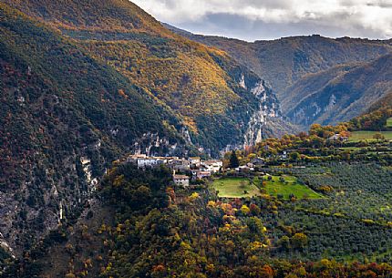 Castellonalto village in autumn, a medieval village on a cliff surrounded by a deep gorge in Valnerina valley, Umbria, Italy, Europe