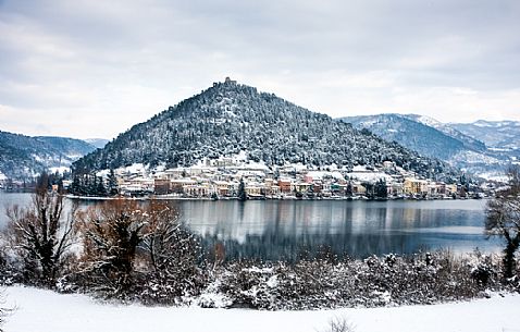 Overview of Piediluco lake and the village covered with snow on a winter day, Umbria, Italy, Europe