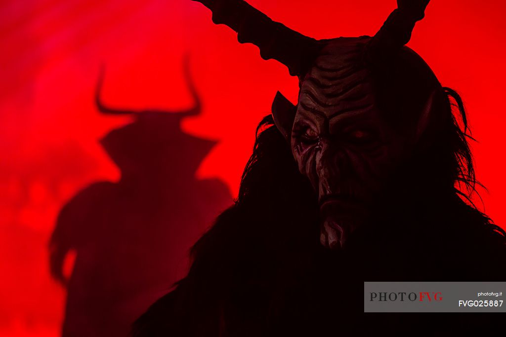 Krampus are horned, antropomorphic folklore figures companions of Saint Nicholas. You can meet them on the 5th or 6th December in regions including Austria, Bavaria, Croatia, Hungary, Slovenia and Northern Italy. This photo was taken in Tarvisio, Friuli Venezia Giulia, Italy