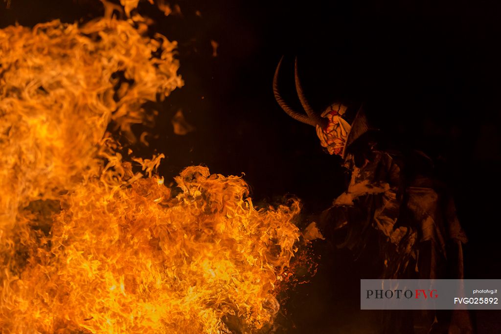 Krampus are horned, antropomorphic folklore figures companions of Saint Nicholas. You can meet them on the 5th or 6th December in regions including Austria, Bavaria, Croatia, Hungary, Slovenia and Northern Italy. This photo was taken in Tarvisio, Friuli Venezia Giulia, Italy