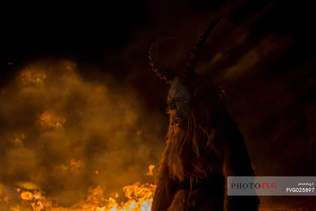 Krampus are horned, antropomorphic folklore figures companions of Saint Nicholas. You can meet them on the 5th or 6th December in regions including Austria, Bavaria, Croatia, Hungary, Slovenia and Northern Italy. This photo was taken in Tarvisio, Friuli Venezia Giulia, Italy