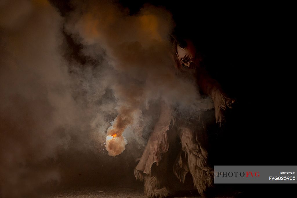 Krampus are horned, antropomorphic folklore figures companions of Saint Nicholas. You can meet them on the 5th or 6th December in regions including Austria, Bavaria, Croatia, Hungary, Slovenia and Northern Italy. This photo was taken in Tarvisio, Friuli Venezia Giulia, Italy