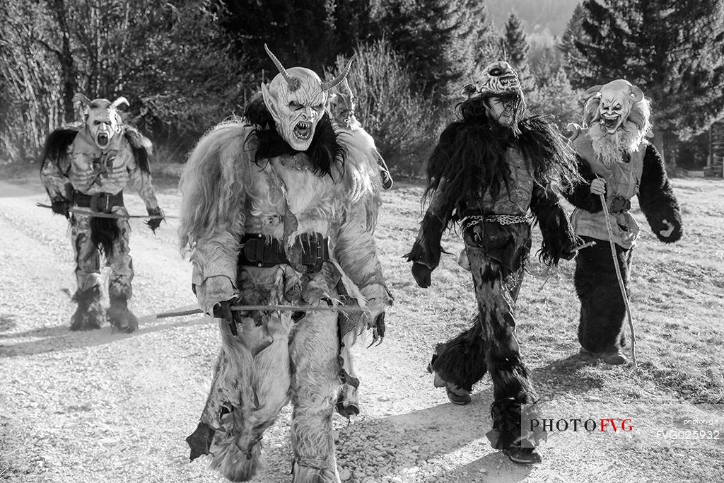 Krampus are horned, antropomorphic folklore figures companions of Saint Nicholas. You can meet them on the 5th or 6th December in regions including Austria, Bavaria, Croatia, Hungary, Slovenia and Northern Italy. This photo was taken in Tarvisio, Friuli Venezia Giulia, Italy