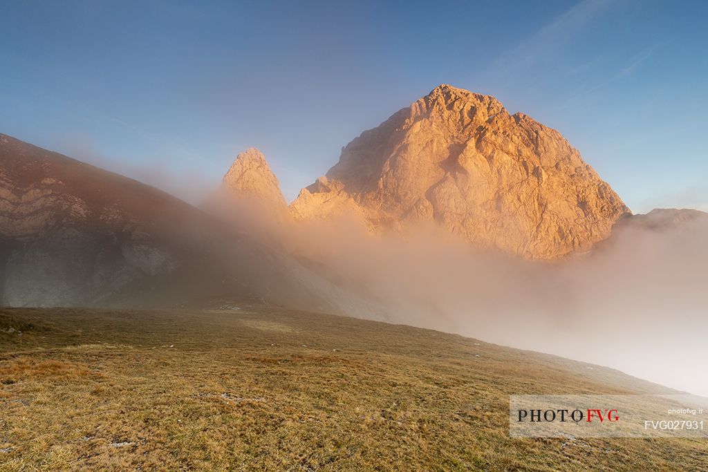 Sunset and pink clouds above Mangart, Julian Alps, Slovenia