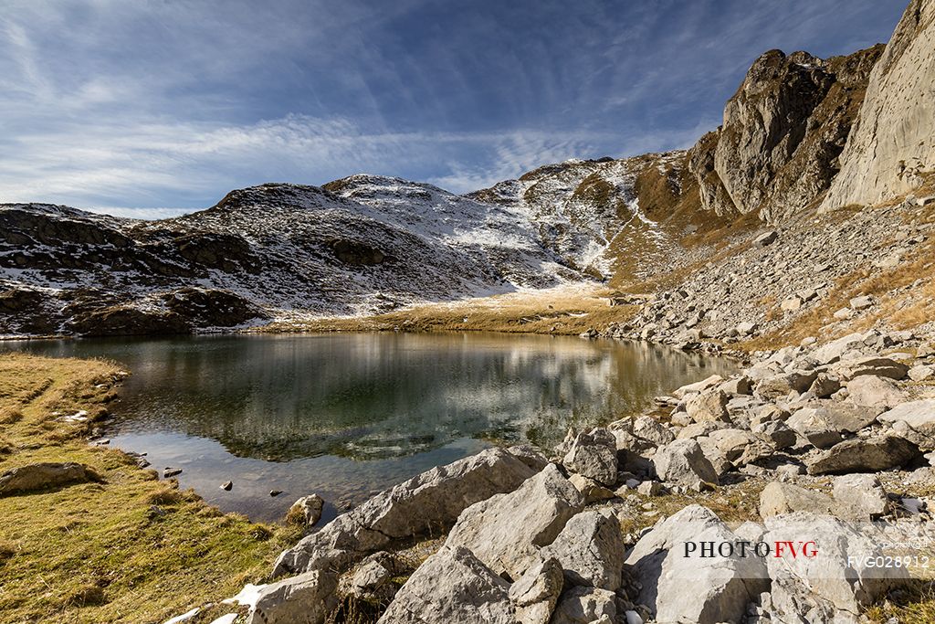 Avostanis Lake, dominated by Creta di Timau and Cima Avostanis mounts it is  one of the most fascinating places in Carnia, Friuli Venezia Giulia, Italy