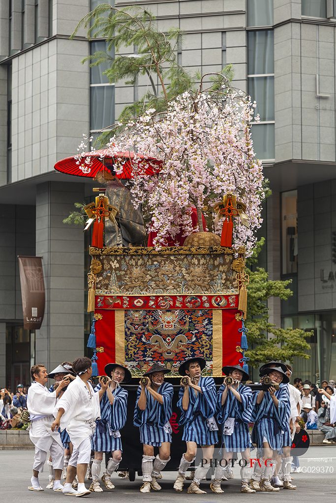 Gion Matsuri is the Japan's most famous festival during the entire month of July,  in which locals and visitors gather to promenade in colorful yucata robes, Kyoto, Japan 