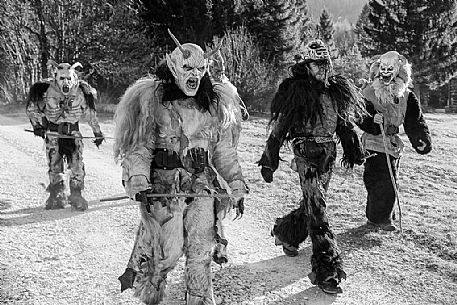 Krampus are horned, antropomorphic folklore figures companions of Saint Nicholas. You can meet them on the 5th or 6th December in regions including Austria, Bavaria, Croatia, Hungary, Slovenia and Northern Italy. This photo was taken in Tarvisio, Friuli Venezia Giulia, Italy Krampus are horned, antropomorphic folklore figures companions of Saint Nicholas. You can meet them on the 5th or 6th December in regions including Austria, Bavaria, Croatia, Hungary, Slovenia and Northern Italy. This photo was taken in Tarvisio, Friuli Venezia Giulia, Italy